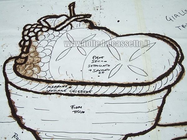 BRUGNATO (Infiorata del Corpus Domini 2011) - Con i fondi di caff viene contornato un disegno raffigurante un cesto di pane e frutta